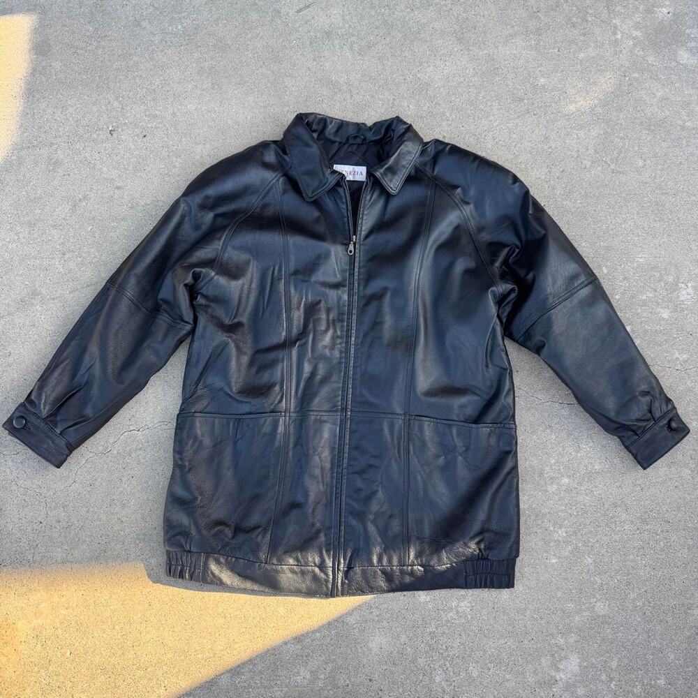 Vintage black leather jacket with